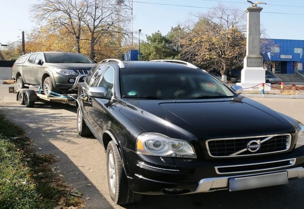 Depistat la volan, cu permis necorespunzător pentru a tracta o platformă cu autoturismul