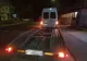 La volanul unui ansamblu rutier format dintr-un autovehicul şi o remorcă tip platformă fără permis corespunzător